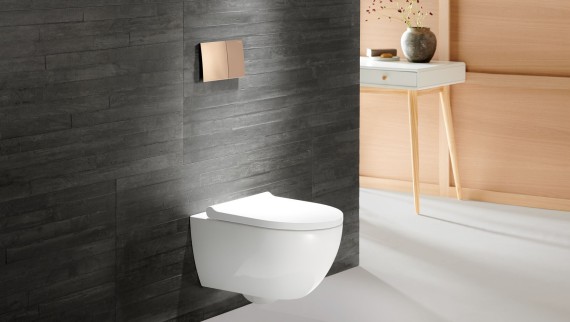 Geberit Acanto WC with actuator plate Sigma70 in red gold Geberit Acanto WC with actuator plate Sigma70 in red gold