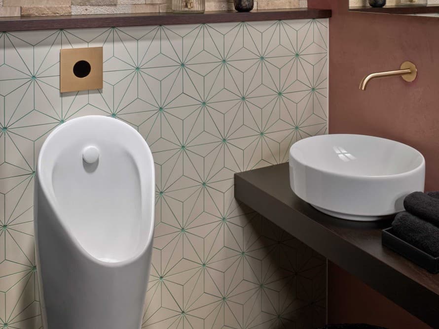 The Type 40 urinal cover plate with touchless flush actuation matches washbasin taps from leading suppliers and adds a stylish touch The Type 40 urinal cover plate with touchless flush actuation matches washbasin taps from leading suppliers and adds a stylish touch