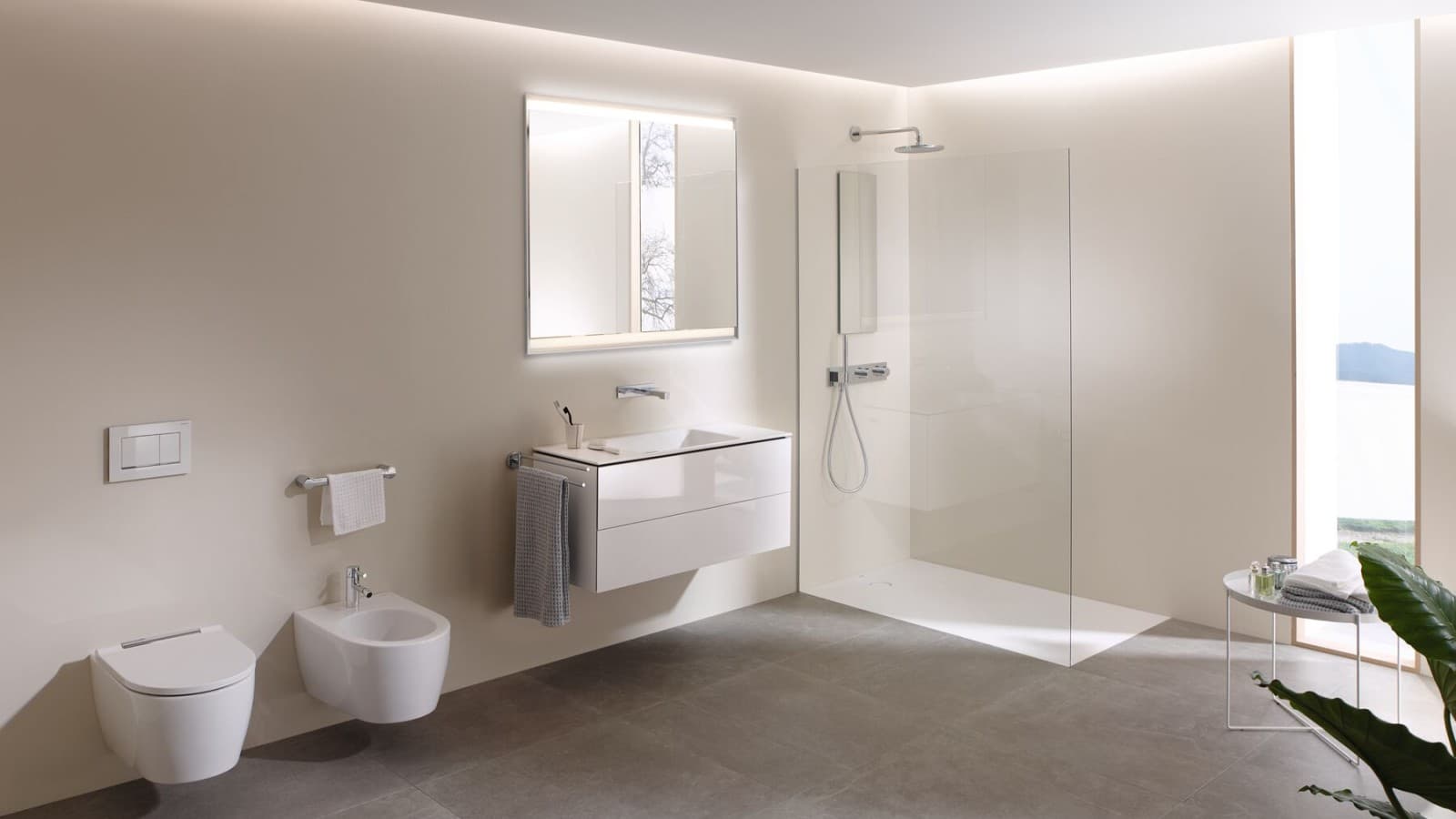 A look a inside with a large bathroom with Geberit AquaClean Mera shower toilet, bathroom furniture and bathroom ceramics A look a inside with a large bathroom with Geberit AquaClean Mera shower toilet, bathroom furniture and bathroom ceramics