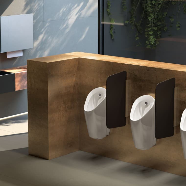 Urinal divisions create a visual shield for more privacy Urinal divisions create a visual shield for more privacy